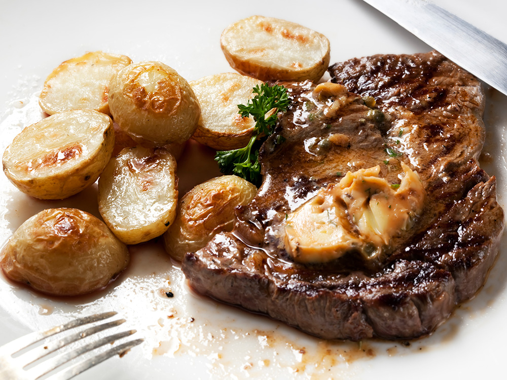 Steak with mushrooms and potatoes